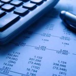 financial statement with calculator and pen financial statement with calculator and pen